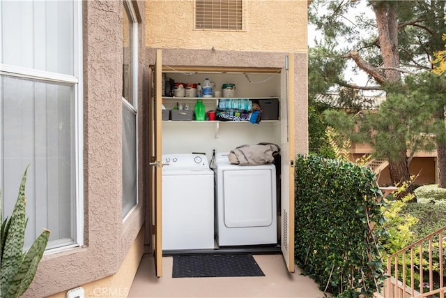 19431 Rue De Valore Unit 1G, Lake Forest, CA 92610 - laundry area featuring washing machine and clothes dryer