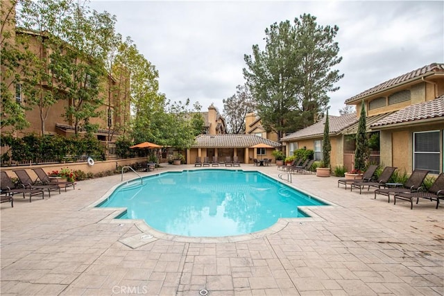 19431 Rue De Valore Unit 1G, Lake Forest, CA 92610 - community pool featuring a patio