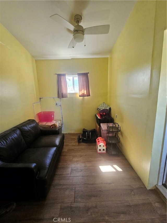 31940 Zircon Rd, Lucerne Valley, CA 92356 - sitting room featuring a ceiling fan and hardwood / wood-style floors