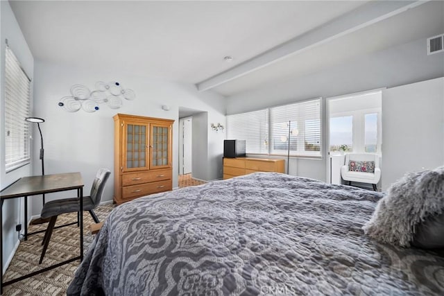 2450 Cameron Ave, Covina, CA 91724 - carpeted bedroom featuring beamed ceiling, visible vents, multiple windows, and baseboards