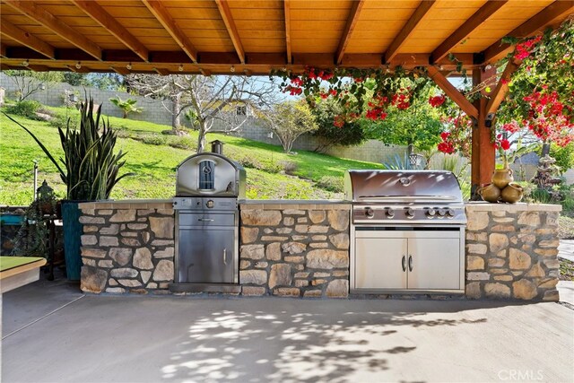 2450 Cameron Ave, Covina, CA 91724 - view of patio / terrace featuring an outdoor kitchen, a fenced backyard, and grilling area