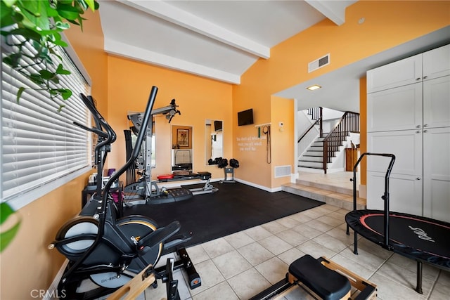 2450 Cameron Ave, Covina, CA 91724 - exercise room featuring tile patterned floors, baseboards, high vaulted ceiling, and visible vents