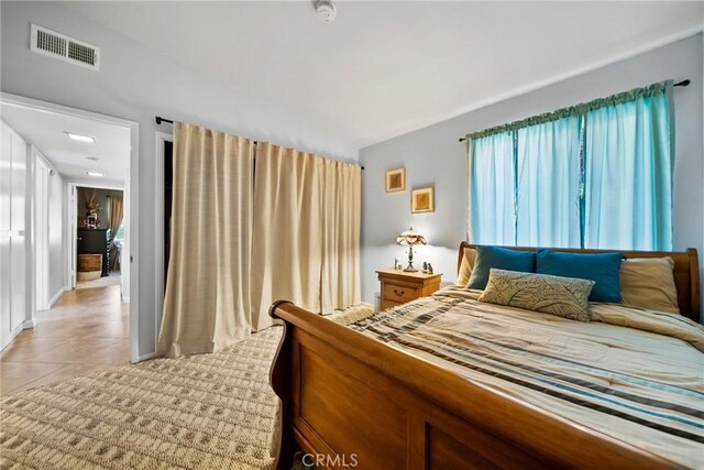 2450 Cameron Ave, Covina, CA 91724 - bedroom featuring visible vents and light tile patterned floors