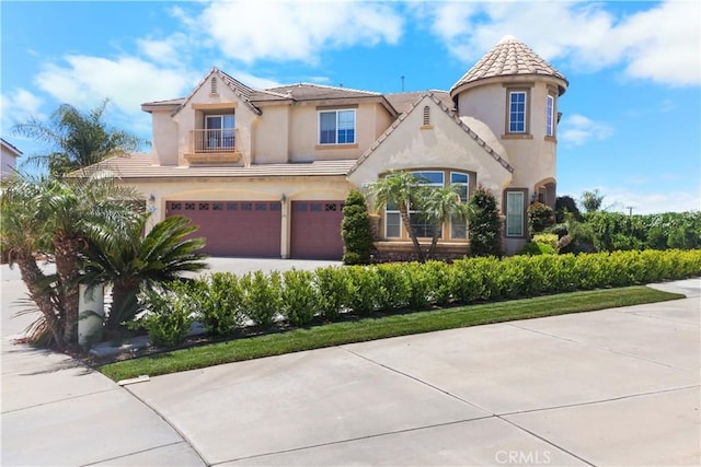 19131 Camassia Ct, Riverside, CA 92508 - view of front of property with a garage, a tile roof, stucco siding, and driveway