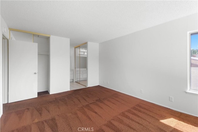 19131 Camassia Ct, Riverside, CA 92508 - unfurnished bedroom with carpet flooring, ensuite bath, and a textured ceiling