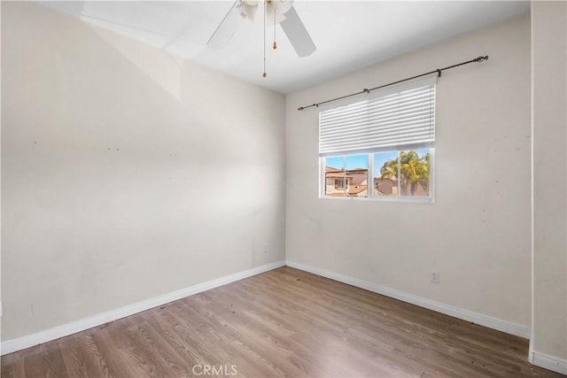 19131 Camassia Ct, Riverside, CA 92508 - unfurnished room featuring wood finished floors, a ceiling fan, and baseboards