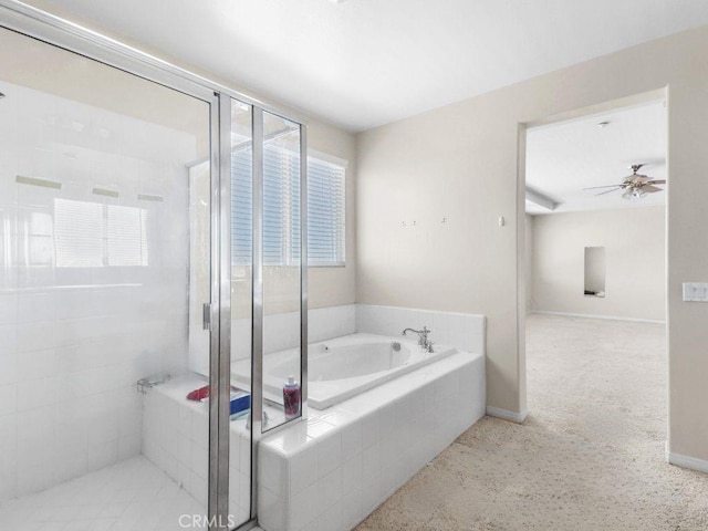 19131 Camassia Ct, Riverside, CA 92508 - full bathroom with a bath, a shower stall, ceiling fan, and baseboards