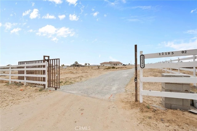 12185 Atsina Rd, Phelan, CA 92371 - view of gate with fence