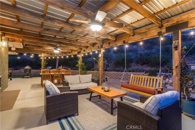 33660 White Feather Rd, Acton, CA 93510 - patio at night featuring outdoor lounge area, ceiling fan, and a patio