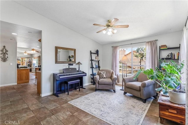 33660 White Feather Rd, Acton, CA 93510 - living area with a ceiling fan, lofted ceiling, baseboards, and dark stone finish floors