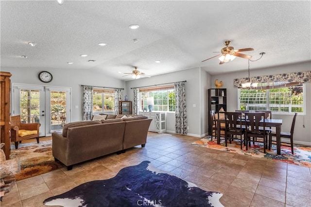 33660 White Feather Rd, Acton, CA 93510 - tiled living room featuring a ceiling fan, a textured ceiling, lofted ceiling, and baseboards