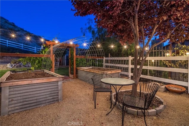 33660 White Feather Rd, Acton, CA 93510 - yard at twilight with a garden