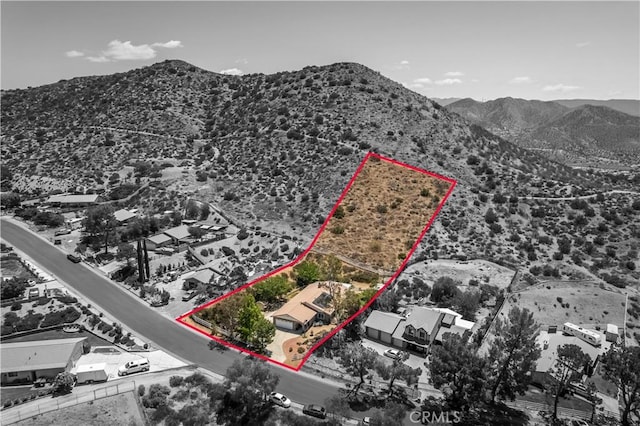 33660 White Feather Rd, Acton, CA 93510 - aerial view of property and surrounding area featuring a mountainous background and property boundaries highlighted