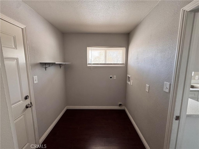laundry room with laundry area, hookup for a washing machine, baseboards, and hookup for an electric dryer