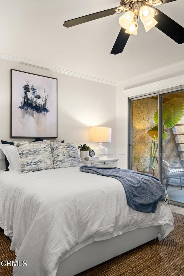 carpeted bedroom featuring crown molding, ceiling fan, and access to exterior