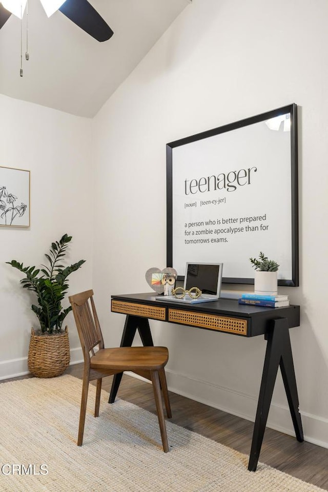 office with baseboards, lofted ceiling, wood finished floors, and ceiling fan