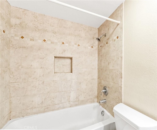 full bathroom featuring toilet and shower / washtub combination