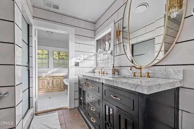 1900 Taft Ave, Los Angeles, CA 90068 - bathroom with a sink, a soaking tub, double vanity, and visible vents