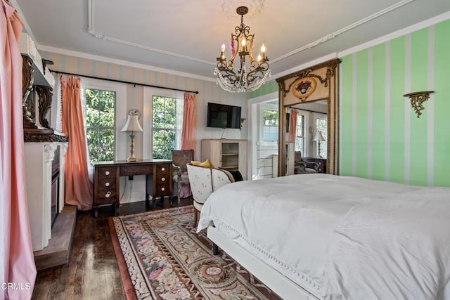 1900 Taft Ave, Los Angeles, CA 90068 - bedroom featuring crown molding, dark wood finished floors, and a chandelier