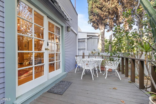 1900 Taft Ave, Los Angeles, CA 90068 - wooden terrace with outdoor dining area