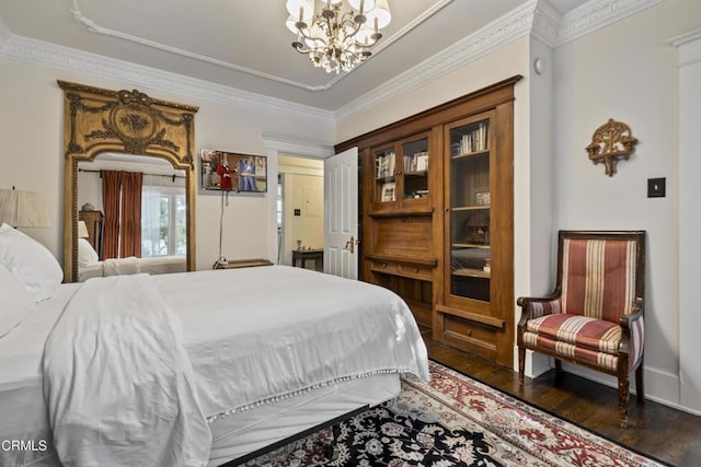 1900 Taft Ave, Los Angeles, CA 90068 - bedroom with an inviting chandelier, ornamental molding, and wood finished floors