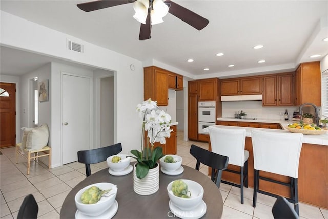 dining area featuring recessed lighting, ceiling fan, visible vents, and light tile patterned floors