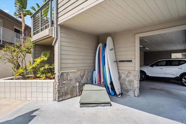 exterior space with a carport