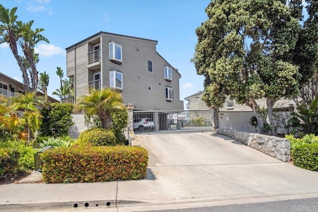 exterior space with concrete driveway