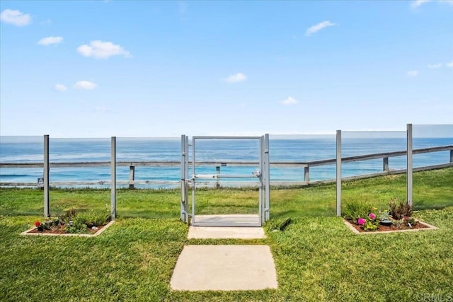 view of water feature with fence