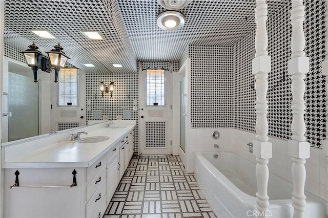 4300 Parkview Dr, Lakewood, CA 90712 - bathroom featuring a sink, a wealth of natural light, and a bath