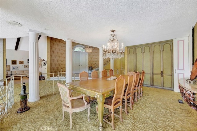 4300 Parkview Dr, Lakewood, CA 90712 - dining room featuring ornate columns, a textured ceiling, light colored carpet, and a chandelier