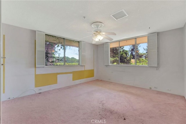 4300 Parkview Dr, Lakewood, CA 90712 - carpeted spare room featuring a ceiling fan, visible vents, and a wealth of natural light