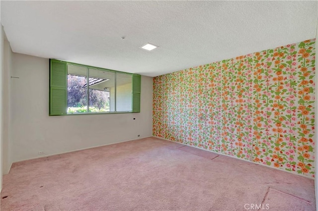 4300 Parkview Dr, Lakewood, CA 90712 - carpeted empty room with a textured ceiling and wallpapered walls