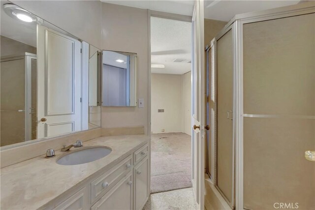 4300 Parkview Dr, Lakewood, CA 90712 - bathroom featuring vanity and a shower with door