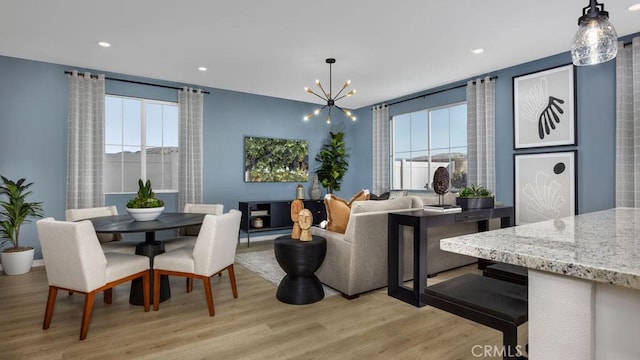 32798 Crystal Cove Ct, Winchester, CA 92596 - dining area with recessed lighting, light wood-type flooring, and a notable chandelier