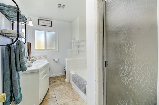 3871 San Mateo Ave, Riverside, CA 92504 - full bathroom with visible vents, vanity, baseboards, tile patterned floors, and a stall shower