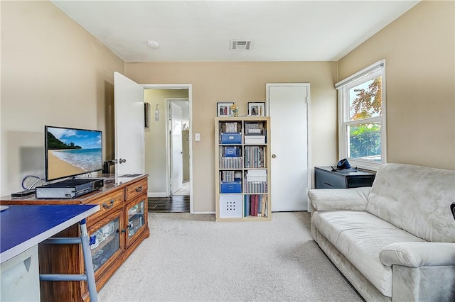 3871 San Mateo Ave, Riverside, CA 92504 - living room with baseboards, carpet, and visible vents