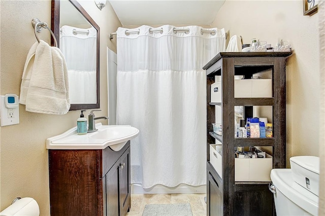 3871 San Mateo Ave, Riverside, CA 92504 - bathroom with toilet, shower / bathtub combination with curtain, and vanity