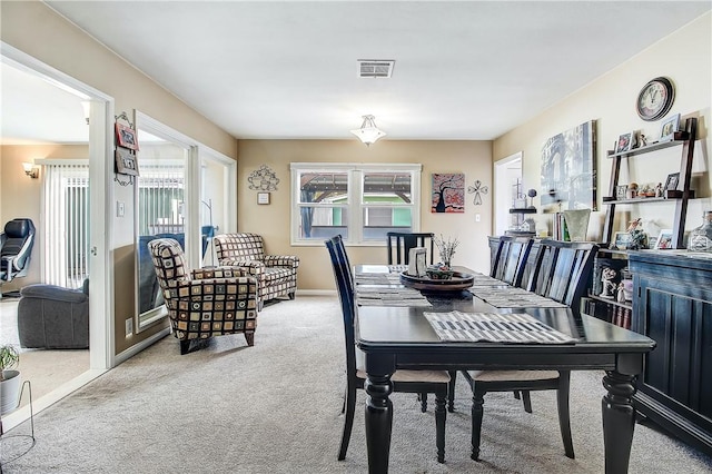 3871 San Mateo Ave, Riverside, CA 92504 - dining area featuring visible vents, baseboards, and carpet floors
