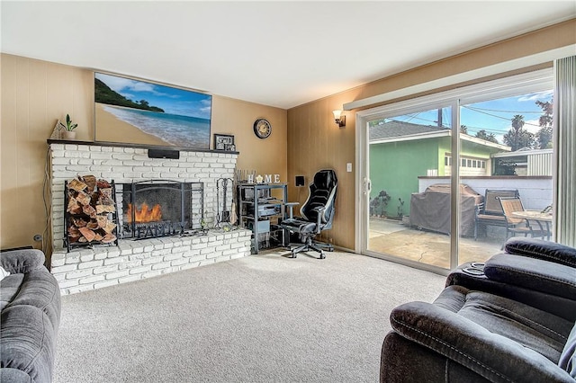 3871 San Mateo Ave, Riverside, CA 92504 - living room with carpet flooring, wood walls, and a fireplace