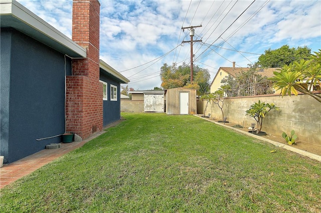 3871 San Mateo Ave, Riverside, CA 92504 - view of yard with fence, an outbuilding, and a storage unit