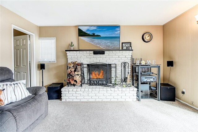 3871 San Mateo Ave, Riverside, CA 92504 - living room featuring a fireplace, carpet, and wooden walls