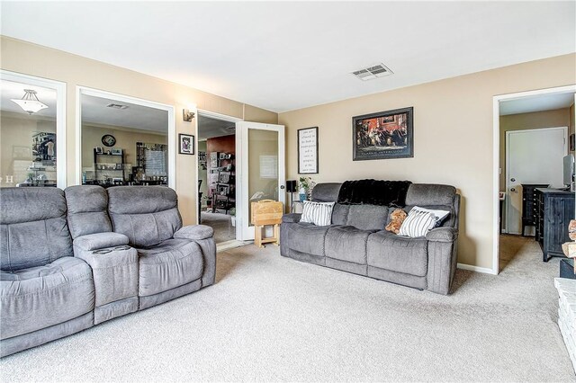 3871 San Mateo Ave, Riverside, CA 92504 - living room featuring visible vents, carpet, and baseboards