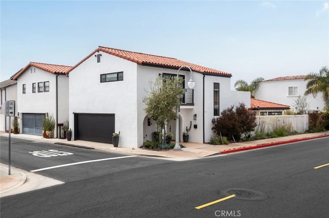 317 Via Lido Nord, Newport Beach, CA 92663 - mediterranean / spanish-style house with an attached garage, stucco siding, and a tiled roof
