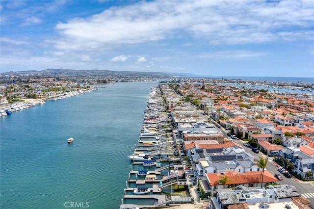 birds eye view of property featuring a water view and a residential view