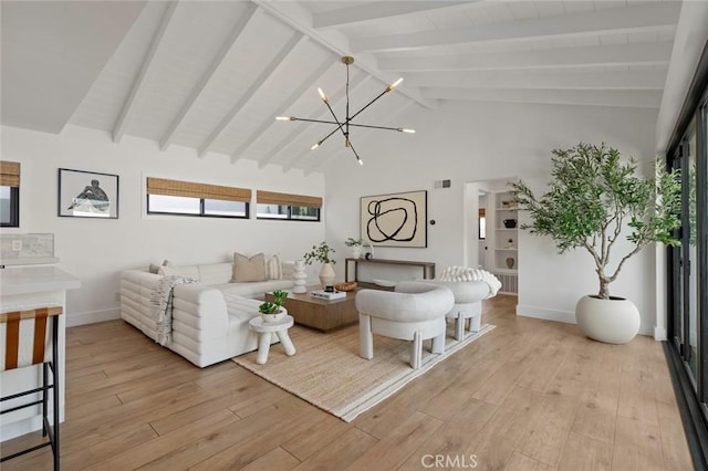 living room with visible vents, baseboards, light wood finished floors, a notable chandelier, and vaulted ceiling with beams