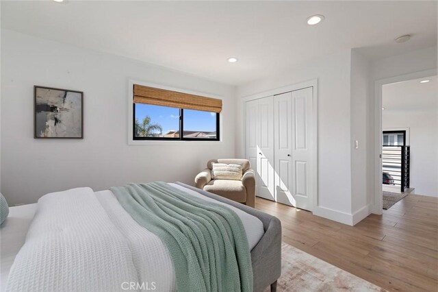 317 Via Lido Nord, Newport Beach, CA 92663 - bedroom with light wood-style floors, recessed lighting, a closet, and baseboards