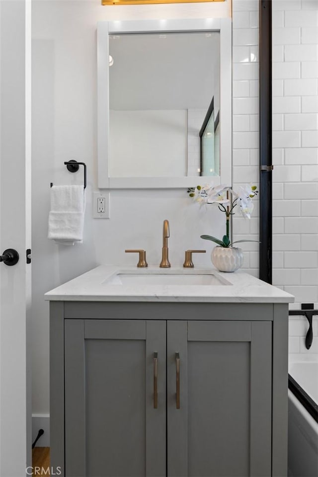 bathroom with vanity and shower / bathing tub combination