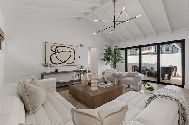 317 Via Lido Nord, Newport Beach, CA 92663 - living room featuring wood finished floors, beamed ceiling, a chandelier, and high vaulted ceiling