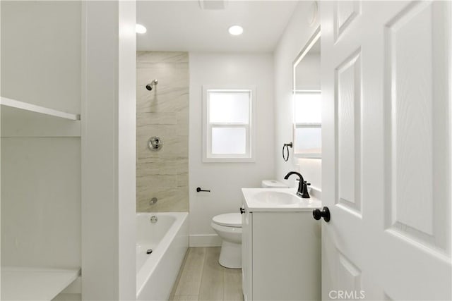full bath with vanity, toilet, and wood finished floors